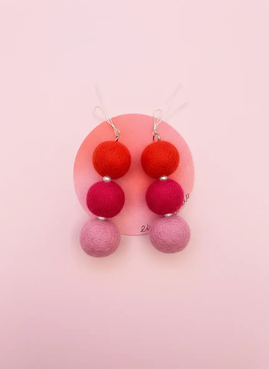 Roze bollen oorbellen