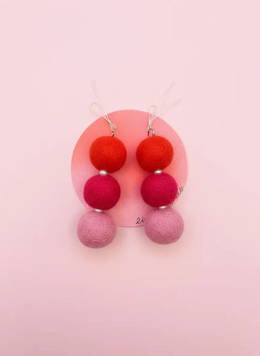 Roze bollen oorbellen