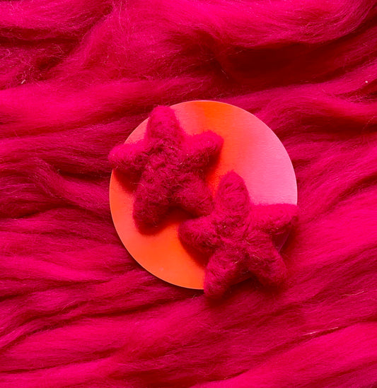 De roze ster-oorbellen